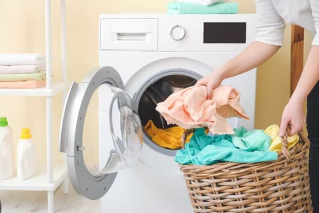 Essential Condo Cleaning Tips - Handle laundry with care